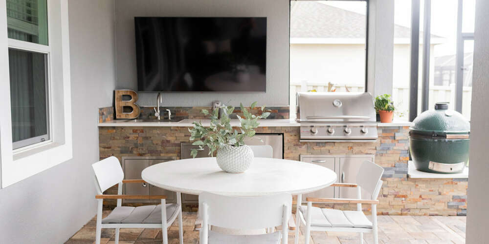 White dining table- bricks counter-silver meat grill